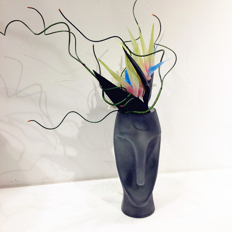 Modern simplified face art bottle floral emulation flower simulation plant home decoration1