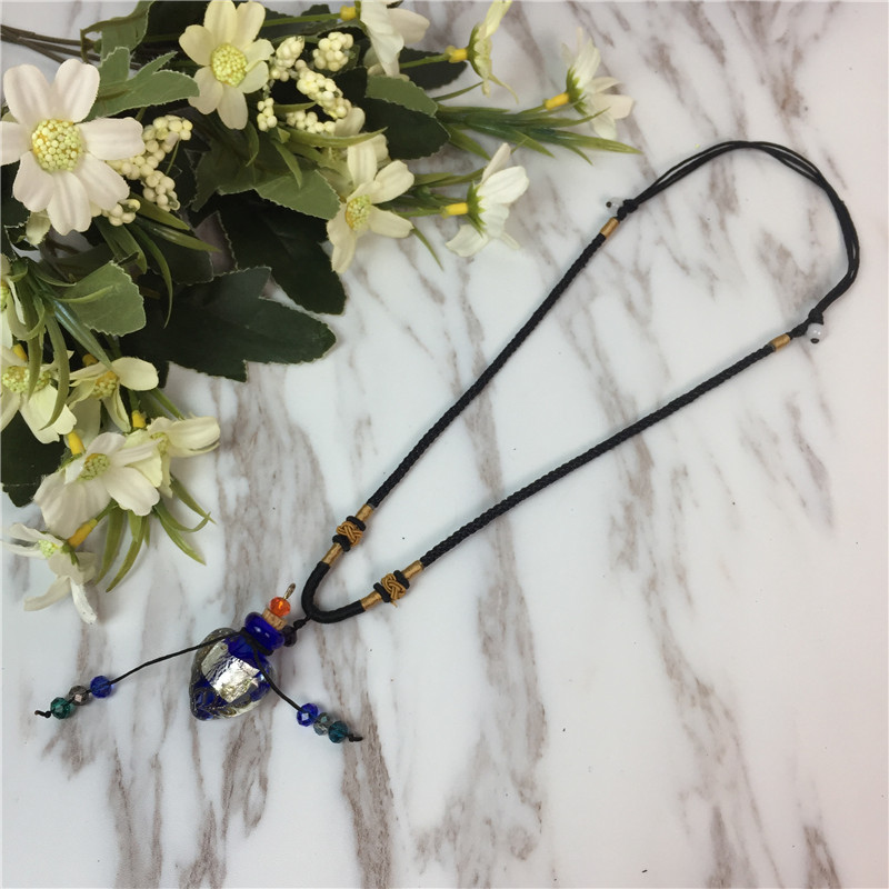 Perfume bottle Necklace decorative glass pendant pendant retro aromatherapy cinnabar lanugo sweater chain female accessories1