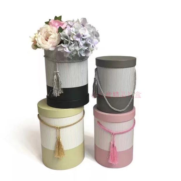Small tassel hug bucket of flowers three piece flower box box box column portable tub1